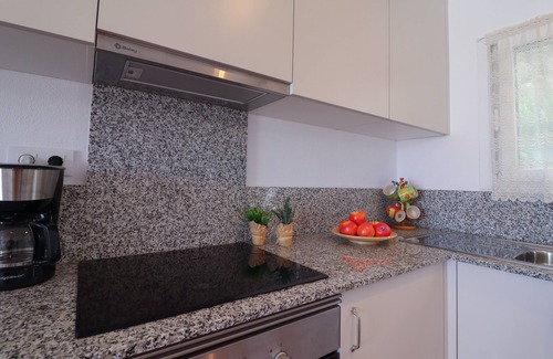 Arenal d'en Castell Apartment | Family-friendly, Nice, First-line Apartment with Stunning Beach and Sea views,AC
