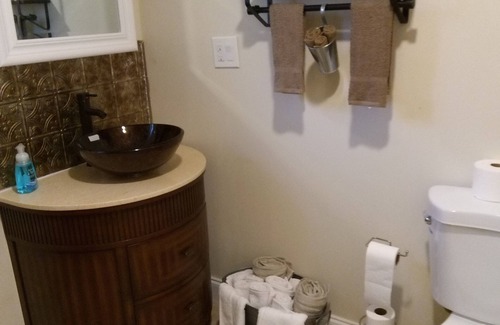Forest City House | Family Friendly Retreat:nWe provide all bath essentials. Fully equipped kitchen