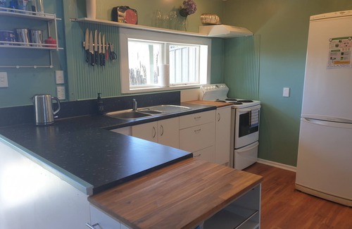 Hokio Beach House | Family friendly and pet friendly. A kiwi bach holiday at Hōkio Beach.