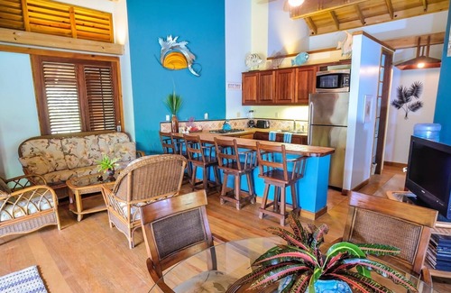 Palmetto Bay House | Family Friendly Beach Bungalow | Private Eco Dive Resort With A Pool & Beach