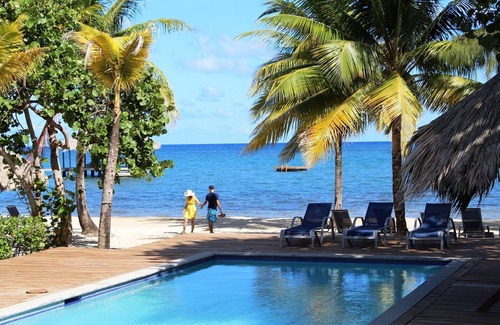 Palmetto Bay House | Family Friendly Beach Bungalow | Private Eco Dive Resort With A Pool & Beach