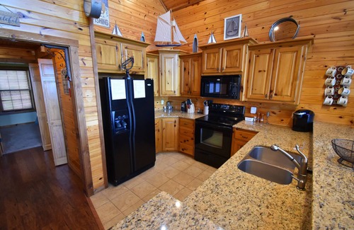 Vian Cabin | Family friendly log home has great lake views from huge deck!