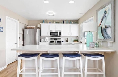 Crystal Beach House | Family Getaway! 1 Min to Beach . King Bed . Rec Room . Elevator . Serene Area