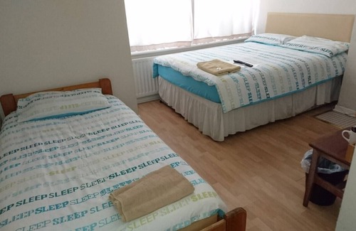 Harlington House | Family Room Sleeps 3 with 1 double and 1 single bed Ground Floor Private shower