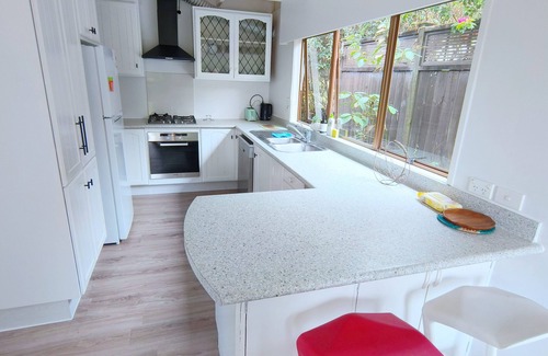 Glenfield House | Family room with door lock and self bathroom with bush view