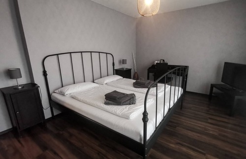 Neumuenster House | Family room with two separate bedrooms