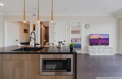 Currie Barracks Condo | Family Stylish 2BR Condo w/City View, DT, Balcony, F/Parking & In-Suite Laundry!