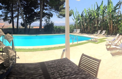 Partanna Villa | Fantastic pool surrounded by a 10,000 square meters of private garden