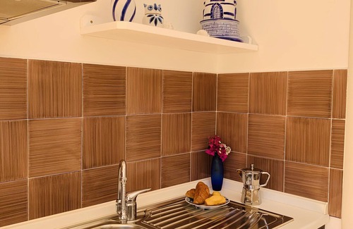 Marina del Cantone Apartment | Felicia's corner studio apartment 2 steps from the sea