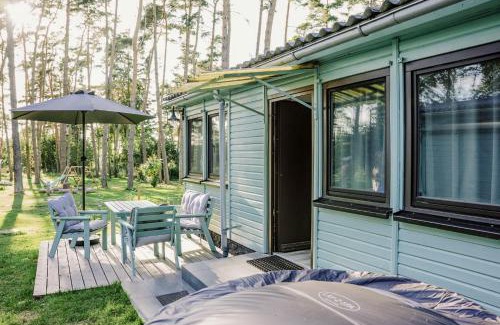 Luetow House | Ferienhäuser Insel Usedom Waldhaus 3 mit Whirlpool - Direkt am Achterwasser