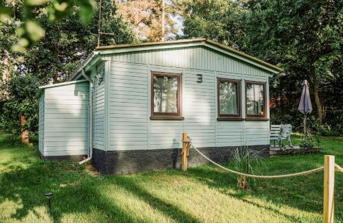 Luetow House | Ferienhäuser Insel Usedom Waldhaus 3 mit Whirlpool - Direkt am Achterwasser