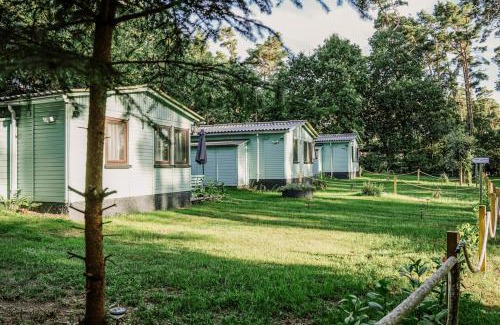 Luetow House | Ferienhäuser Insel Usedom Waldhaus 3 mit Whirlpool - Direkt am Achterwasser