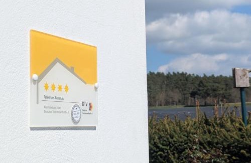 Mustin House | Ferienhaus am See mit Ruderboot