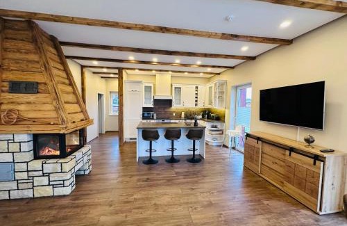 Dolgen am See House | Ferienhaus MILA - Pool, Sauna, Whirlwanne, 5000qm Privatgelände mit Bolzplatz