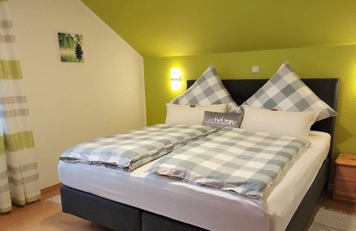 Wahlrod Apartment | Ferienhaus, Wohnung B - Ferienwohnungen Hammermühle