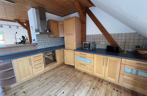 Boitzenburger Land Resort | Ferienhof Schmetterlingsgarten Ferienwohnung 2 Dachgeschoss mit Garten