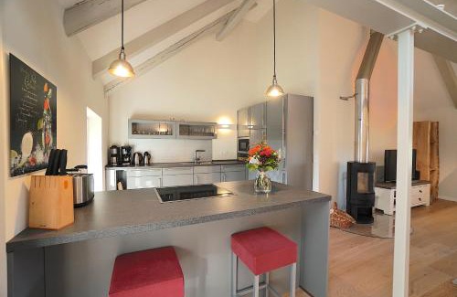 Borgwedel Apartment | Ferienwohnung Am Apfelbaum - romantische Remise direkt am Golfplatz und der Schlei