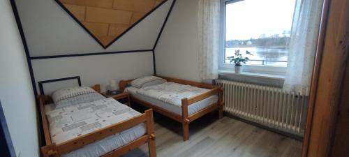 Sudwinsen Apartment | Ferienwohnung Landmann