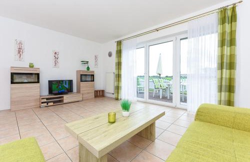 Esens Apartment | Ferienwohnung Muschel 1 mit Terrasse und Garten, Bensersiel