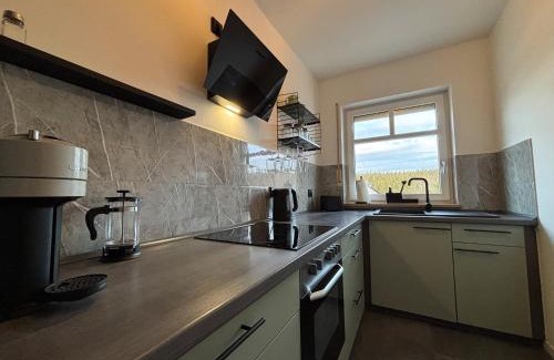 Oberhof Apartment | Ferienwohnung Naturkraft mit Tiefgaragenstellplatz und Balkon