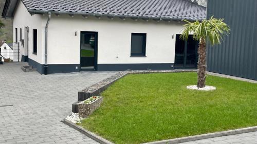Neumagen-Dhron Apartment | Ferienwohnung ' Wein unter Palmen '