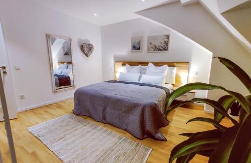 Mering Apartment | Ferienwohnung "Zugspitze" - 95qm Maisonette in Mering Zentrum