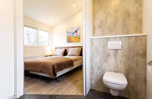 Lunteren Ski Chalet | ✓ Ferox with a disability at Landgoed de Scheleberg ✓ Holiday home for 4 persons ✓ Situated in Lunteren (Gelderland) ✓ Holiday park at the Veluwe ✓ Book directly at the park