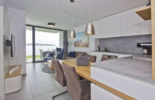 Middelhagen Apartment | FeWo Heimathafen - modern vacation apartment near the water with sea view -