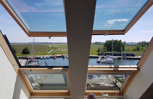 Karlshagen Apartment | FEWO SEGELHAFENIDYLL, direct and quiet waterfront location, WLAN - vacation apartment