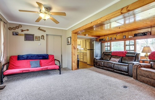 Evart Cabin | Fish, Tube & Unwind: Muskegon River Family Retreat