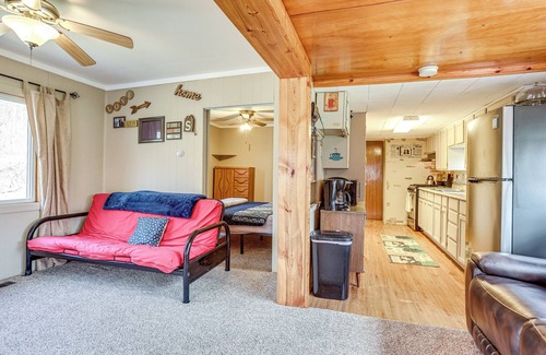 Evart Cabin | Fish, Tube & Unwind: Muskegon River Family Retreat