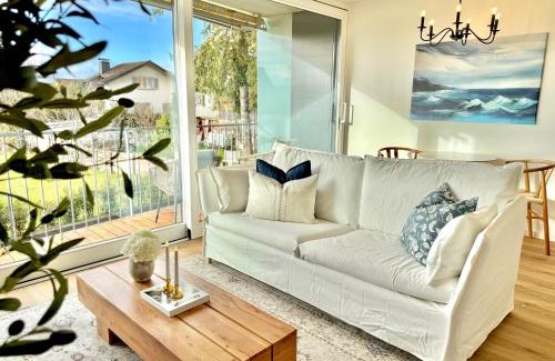 Schwarzach Apartment | FLAIR Apartments Vorarlberg - Stilvolles Wohnen nahe Bodensee & Alpen - Küche, Balkon & Gratis Parkplatz
