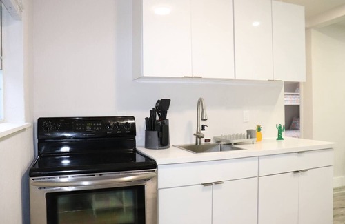 Dania Beach House | Flamingo Beach House – Tropical charm just minutes from the beach.