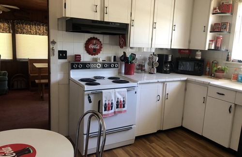 Orange City House | Flamingo Landing is a Charming Little 2 Bedroom Bungalow With Florida Room