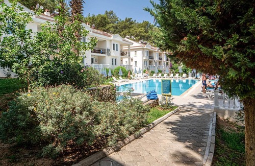 Hisaronu Apartment | Flat w Shared Pool and Balcony 10 min to Oludeniz