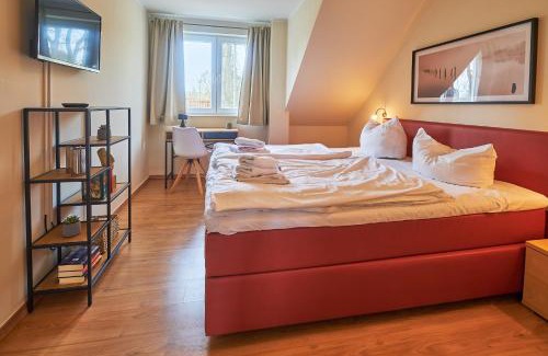 Muritz Apartment | FLEESENTRAUM Seeadler Grand Maisonette - Für Golfer und Familien - Sauna Kamin Balkon Nintendo - Hunde willkommen!