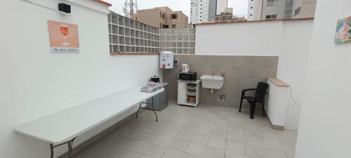 Santa Cruz House | Flores moradas