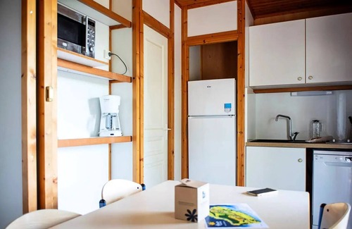 Lissac-sur-Couze Ski Chalet | Flower Camping du Lac du Causse * - Chalet Comfort 26m2 (2 bedrooms) + covered terrace 6m2 lake view 6 people