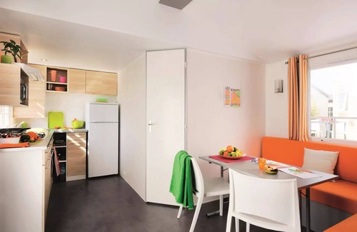 Treignac House | Flower Camping La Plage * - Mobile home Comfort 29m2 (2 bedrooms) + TV + semi-covered terrace 18m2 6 people