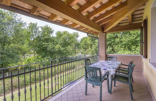 Marano Lagunare Apartment | Folaghe 4, apartment with terrace overlooking the grove