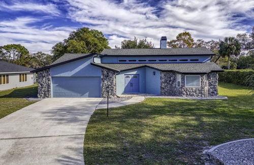 Spring Hill House | Four Beds, three baths, heated pool, and a Golf Course. What more do you need!