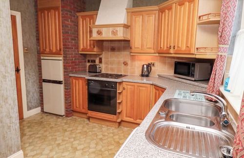 Akeld Cottage | FOXGLOVE COVET, family friendly, with pool in Wooler