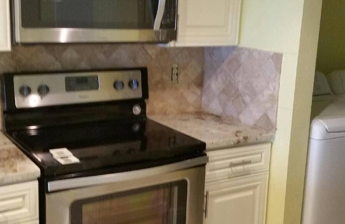 Lower Grand Lagoon Condo | FREE BEACH CHAIRS ALL WEEK 30,000 REMODEL NEW GRANITE CABINETS, 2 NEWPILLOWTOPS