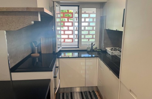 Benfica Apartment | Fresh, Sunny Lisbon Apartment with WiFi, In-Unit Laundry, AC