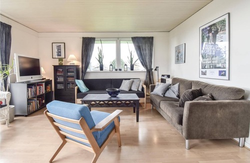 Mesinge House | From this cottage you have a fantastic view over the sea and to Enebær Odde with its characteristic
