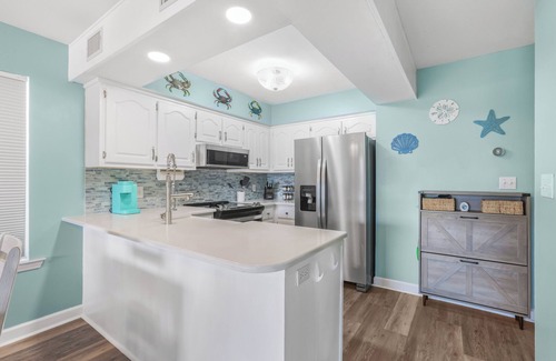 Gulf Shores House | Full Duplex -Steps to Beach, Dining & Shops, 6 Sunny Balconies, Cozy Firepit!