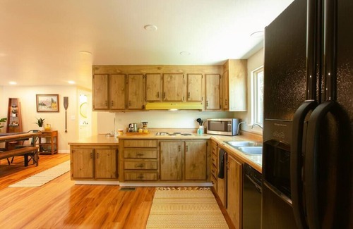 Jackson County House | Fully equipped house on the river with a private fishing hole.