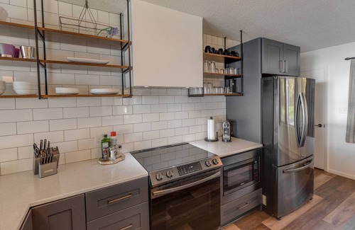 Lake Edward Township House | Fully Remodeled, Gull Lake Chain, Private Tennis Court & Beach