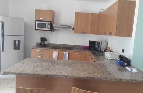 Barranca Apartment | Furnished family-friendly apartment with view of ocean and steps to beach