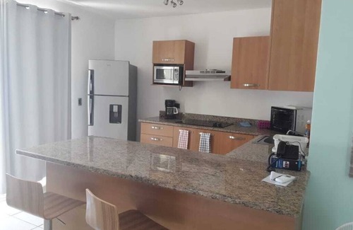Barranca Apartment | Furnished family-friendly apartment with view of ocean and steps to beach